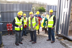 Museum volunteers and staff don hard hats and high-vis for their VIP site tour